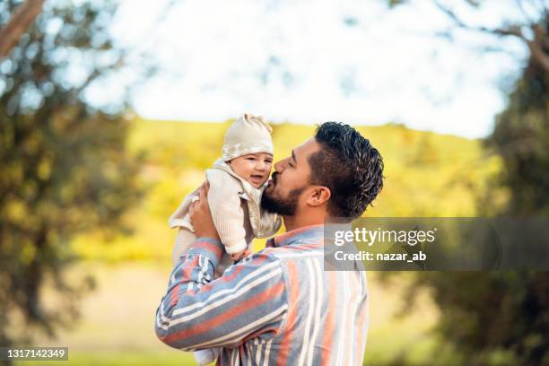 father loving his kid. - baby nature stock pictures, royalty-free photos & images