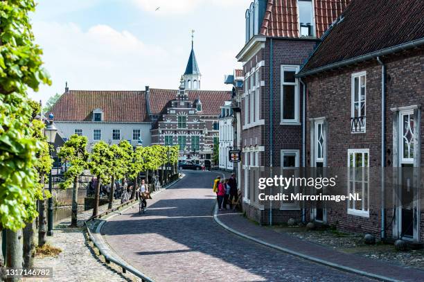kleine spui and museum flehite in amersfoort - amersfoort netherlands stock pictures, royalty-free photos & images