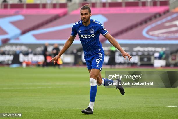 Dominic Calvert-Lewin of Everton celebrates scoring the first goal during the Premier League match between West Ham United and Everton at London...