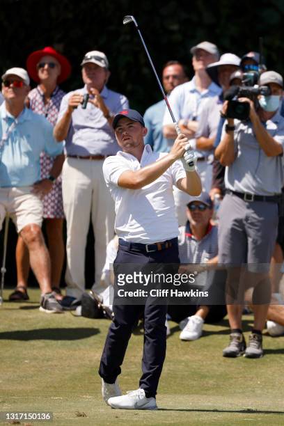 Alex Fitzpatrick of Team Great Britain and Ireland plays his shot from the fifth tee during Sunday singles matches on Day Two of The Walker Cup at...