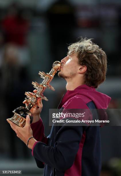 Alexander Zverev of Germany celebrates with the trophy after winning the Mens Singles Final Trophy match against Matteo Berrettini of Italy during...