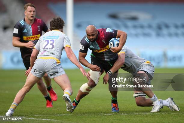 Paul Lasike of Harlequins is tackled by Brad Shields of Wasps during the Gallagher Premiership Rugby match between Harlequins and Wasps at Twickenham...