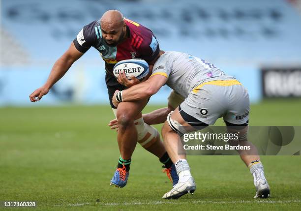 Paul Lasike of Harlequins is tackled by Brad Shields of Wasps during the Gallagher Premiership Rugby match between Harlequins and Wasps at Twickenham...