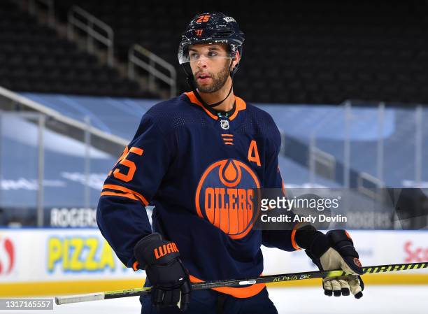 Darnell Nurse of the Edmonton Oilers awaits a face-off during the game against the Vancouver Canucks on May 8, 2021 at Rogers Place in Edmonton,...