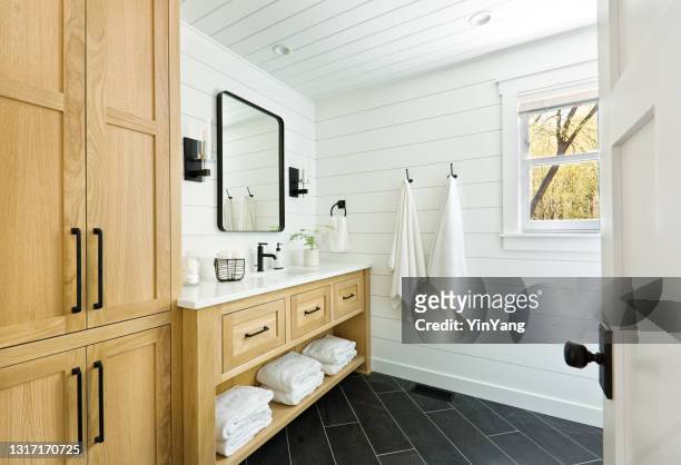 contemporary country home cabin bathroom design with vanity and linen storage - vanity stock pictures, royalty-free photos & images