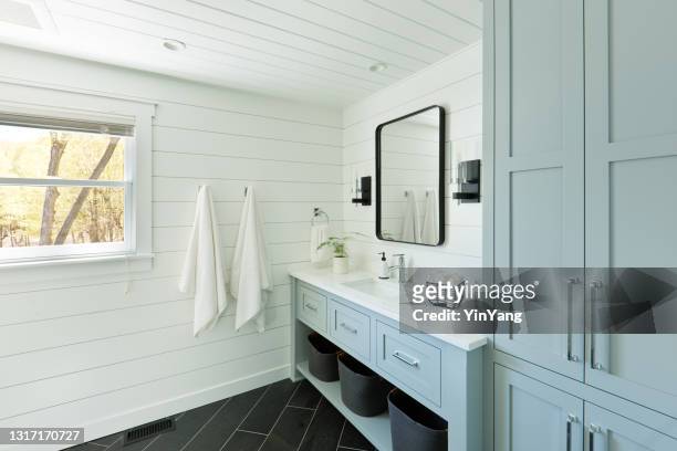contemporary country home cabin bathroom design with vanity and linen storage - vanity stock pictures, royalty-free photos & images
