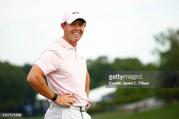 Rory McIlroy of Northern Ireland smiles during the trophy ceremony after winning during the final round of the 2021 Wells Fargo Championship at Quail...