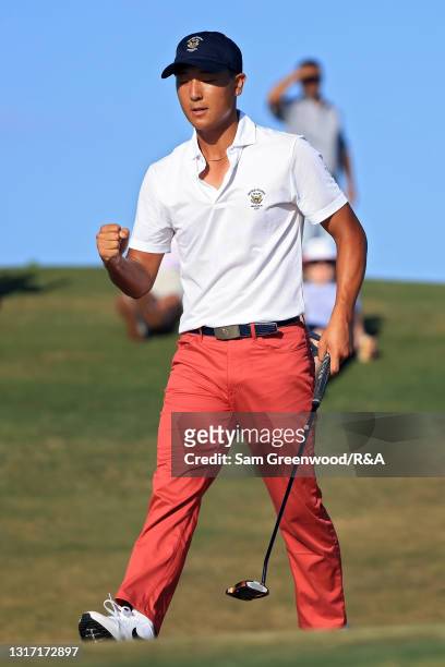 John Pak of Team USA celebrates on the 17th green during Sunday singles matches on Day Two of The Walker Cup at Seminole Golf Club on May 09, 2021 in...