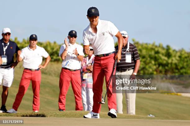 John Pak of Team USA celebrates on the 17th green during Sunday singles matches on Day Two of The Walker Cup at Seminole Golf Club on May 09, 2021 in...