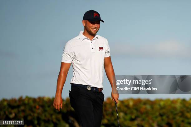 Matty Lamb of Team Great Britain and Ireland reacts to his putt on the 18th green during Sunday singles matches on Day Two of The Walker Cup at...