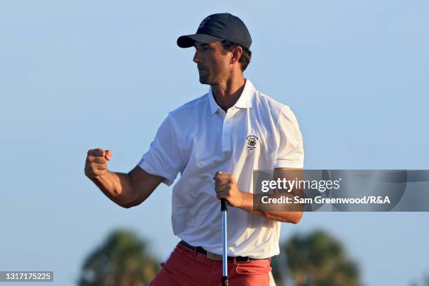 Stewart Hagestad of Team USA reacts to his putt on the 15th green during Sunday singles matches on Day Two of The Walker Cup at Seminole Golf Club on...