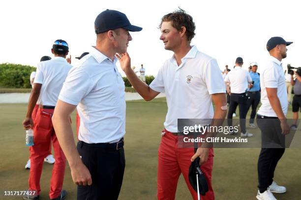 Jack Dyer of Team Great Britain and Ireland meets with Tyler Strafaci of Team USA after Dyer won their match during Sunday singles matches on Day Two...