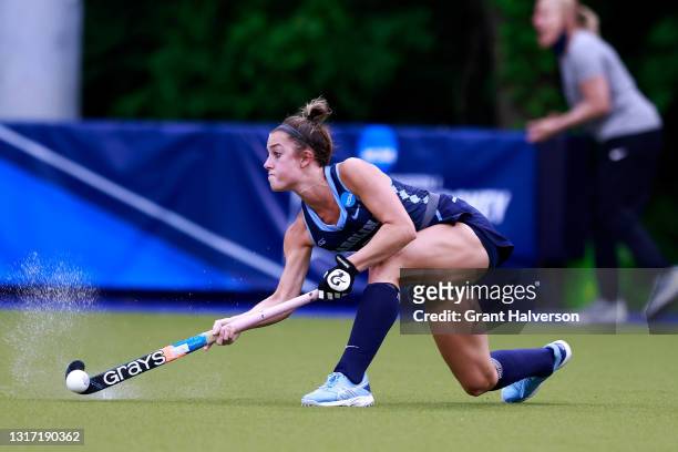 Madison Orobono of the North Carolina Tar Heels sends a pass up the field against the Michigan Wolverines during the Division I Women’s Field Hockey...