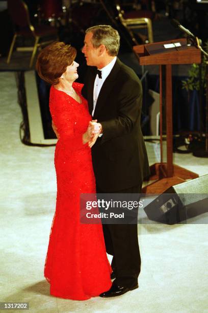 President George W. Bush and First Lady Laura Bush attend one of nine inaugural balls January 20, 2001 in Washington DC.