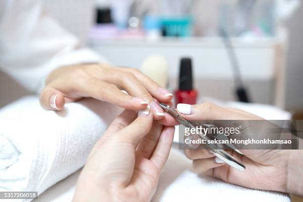 beauty manicure procedure - nagelhaut stock-fotos und bilder