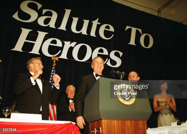 President George W. Bush attend a salute to veterans before making the rounds of the nine inaugural balls January 20, 2001 in Washington DC.