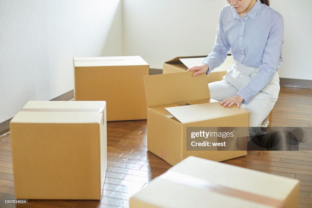 Young single woman moving