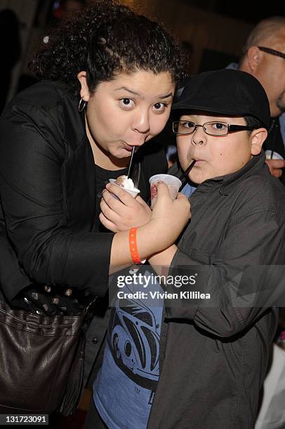 Raini Rodriguez and actor Rico Rodriguez attend the Official AMA Backstage Boutique day 1 at LA Live on November 19, 2010 in Los Angeles, California.
