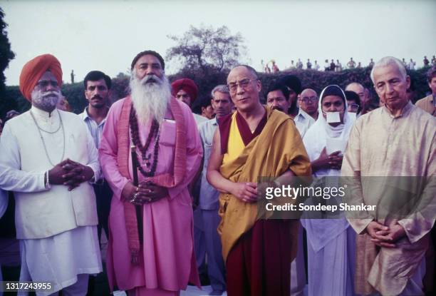 Tibetan spiritual leader Dalai Lama celebrates his 60th birthday with prayers at Rajghat, the memorial for Mahatama Gandhi, in New Delhi, India on...