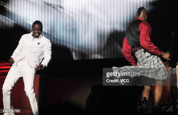 Akon Rapper Concert American singer Akon performs on the stage at Mercedes Benz Arena on ...