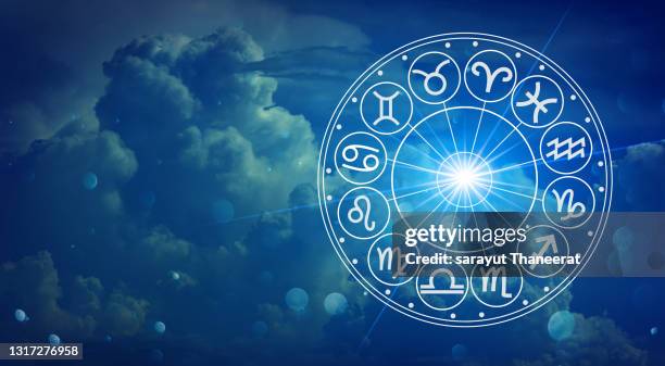 zodiac signs inside of horoscope circle. astrology in the sky with many stars and moons  astrology and horoscopes concept - star signs fotografías e imágenes de stock