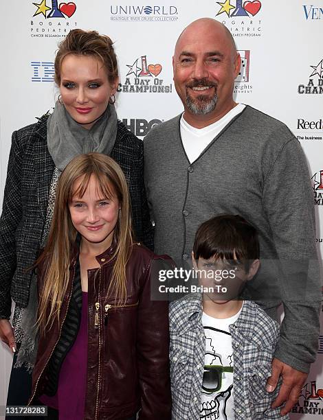 Talent agent Adam Venit , his wife Trina and their children Olivia and Matthew attend Yahoo! Sports presents "A Day of Champions" at Sports Museum of...