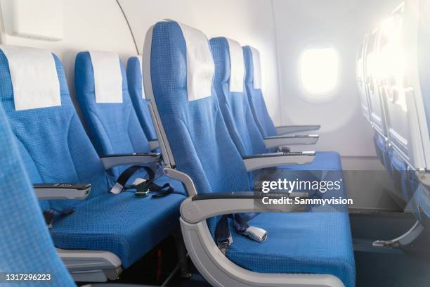 seats in aircraft cabin - siège d'avion photos et images de collection