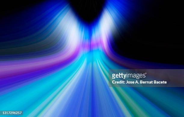 abstract blue color background with infinite light curve lines with vanishing point on a black background. - luce elettrica foto e immagini stock