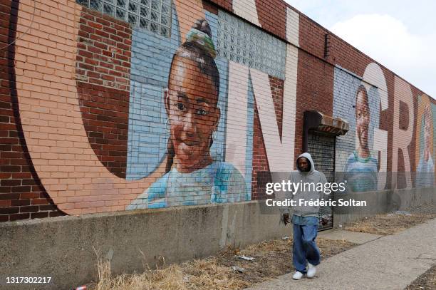 Mural painted in a black district, painted within the "Mural Art Program" which began in 1984. It's an anti-graffiti program in a city economically...