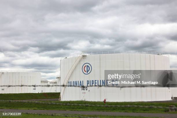 Fuel holding tanks are seen at Colonial Pipeline's Linden Junction Tank Farm on May 10, 2021 in Woodbridge, New Jersey. Alpharetta, Georgia-based...