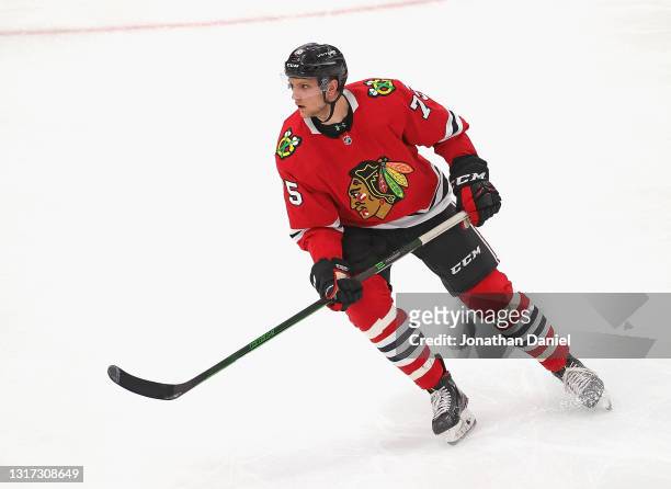 Alec Regula of the Chicago Blackhawks skates against the Dallas Stars at the United Center on May 09, 2021 in Chicago, Illinois. The Blackhawks...