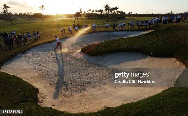 Tyler Strafaci of Team USA plays his shot from the bunker on the 18th hole during Sunday singles matches on Day Two of The Walker Cup at Seminole...