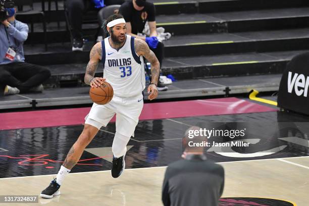 Willie Cauley-Stein of the Dallas Mavericks brings the ball up court during the second quarter against the Cleveland Cavaliers at Rocket Mortgage...