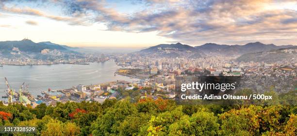 high angle view of townscape against sky - kyushu stockfoto's en -beelden