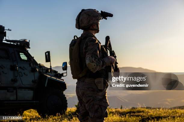 soldier in battlefield - mine resistant ambush protected stock pictures, royalty-free photos & images