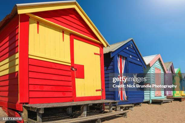 beach huts, brighton beach, melbourne, australia - brighton beach stock pictures, royalty-free photos & images