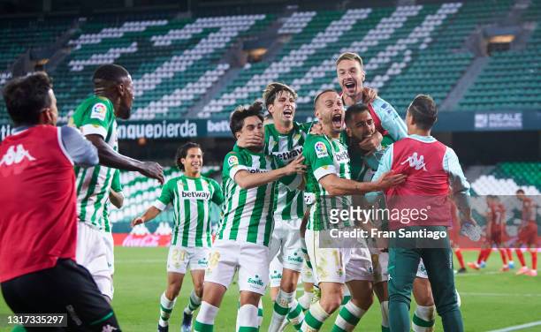 Borja Iglesias of Real Betis celebrates scoring a goal with team mates during the La Liga Santander match between Real Betis and Granada CF at...
