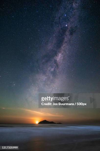 scenic view of sea against star field at night,new zealand - north island new zealand 個照片及圖片檔