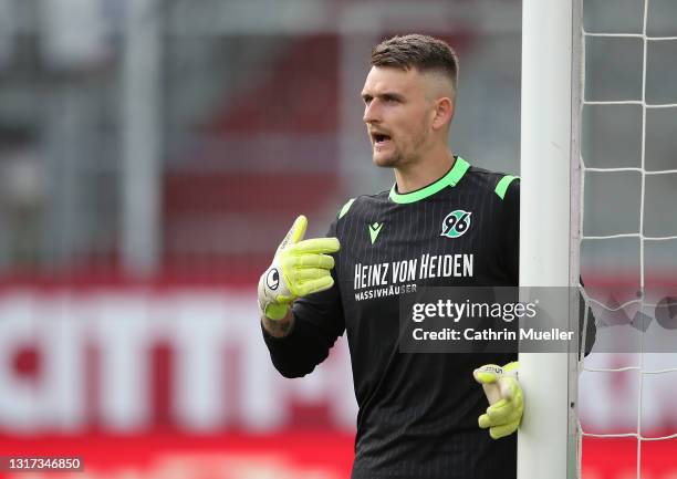 Goalkeeper Martin Hansen of Hannover 96 gestures during the Second Bundesliga match between Holstein Kiel and Hannover 96 at Holstein-Stadion on May...