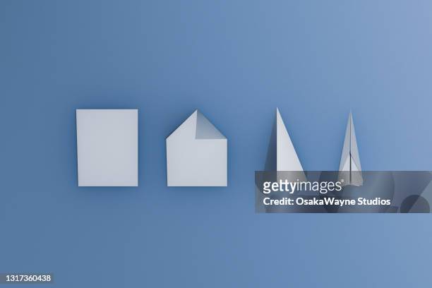 view of production phases fold and fly paper aircraft. four steps folding instructions. - origami stockfoto's en -beelden