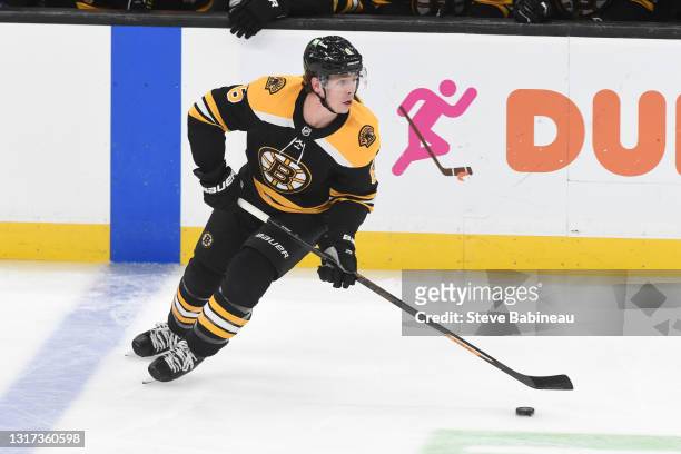 Mike Reilly of the Boston Bruins skates with the puck against the New York Islanders at the TD Garden on May 10, 2021 in Boston, Massachusetts.