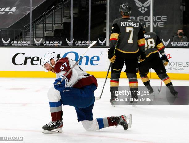 Compher of the Colorado Avalanche reacts after scoring a third-period goal against the Vegas Golden Knights during their game at T-Mobile Arena on...