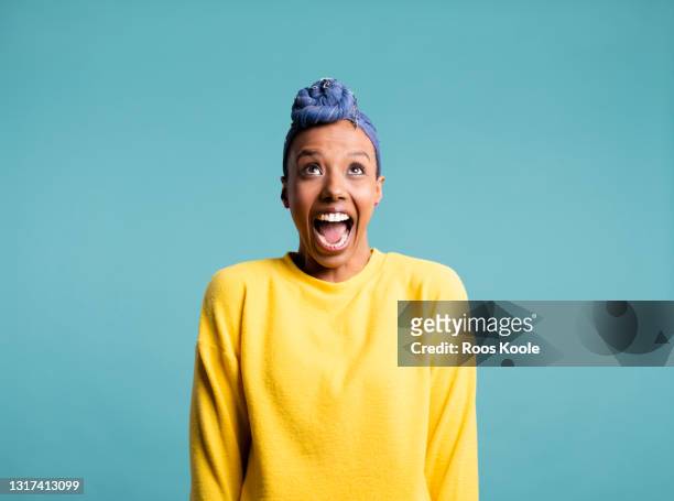 studioportrait of a woman - excitement stockfoto's en -beelden