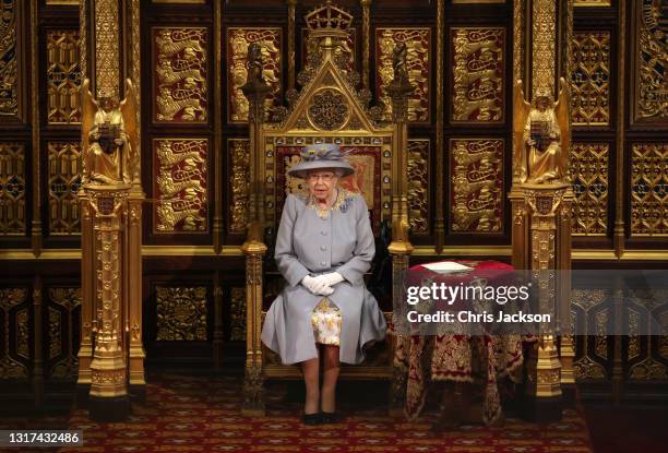 Queen Elizabeth II delivers the Queen's Speech in the House of Lord's Chamber during the State Opening of Parliament at the House of Lords on May 11,...