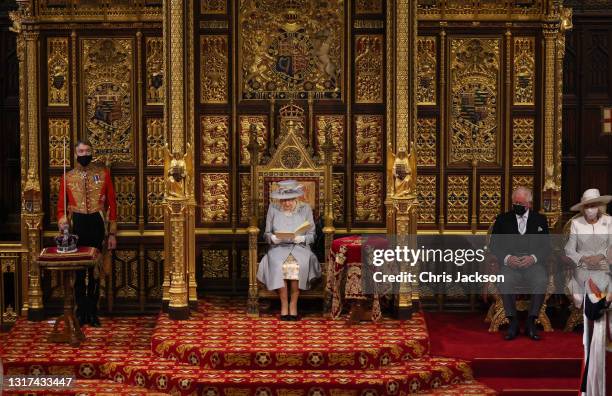 Queen Elizabeth II delivers the Queen's Speech in the House of Lord's Chamber with Prince Charles, Prince of Wales and Camilla, Duchess of Cornwall...