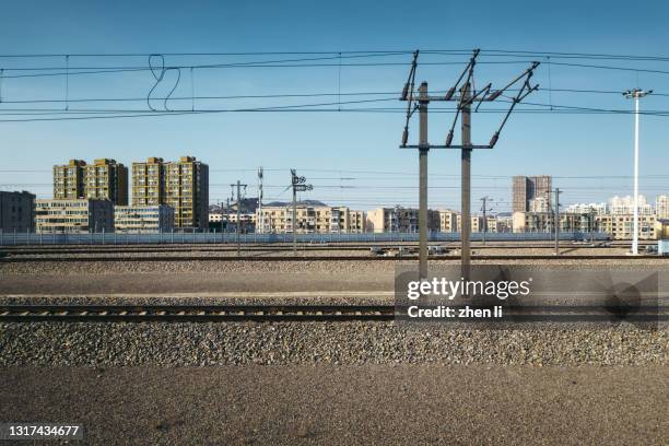 parallel perspective shooting of railway tracks - railroad track stock pictures, royalty-free photos & images