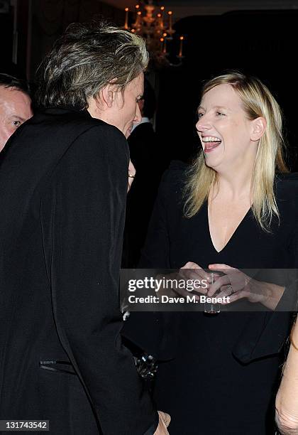 John Taylor and Sarah Burton attend the Harper's Bazaar Women Of The Year Awards in association with Estee Lauder and NET-A-PORTER at Claridges Hotel...