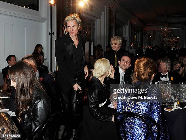 John Taylor and Nick Rhodes attend the Harper's Bazaar Women Of The Year Awards in association with Estee Lauder and NET-A-PORTER at Claridges Hotel...