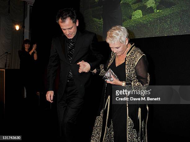 Michael Grandage and Dame Judi Dench attend the Harper's Bazaar Women Of The Year Awards in association with Estee Lauder and NET-A-PORTER at...