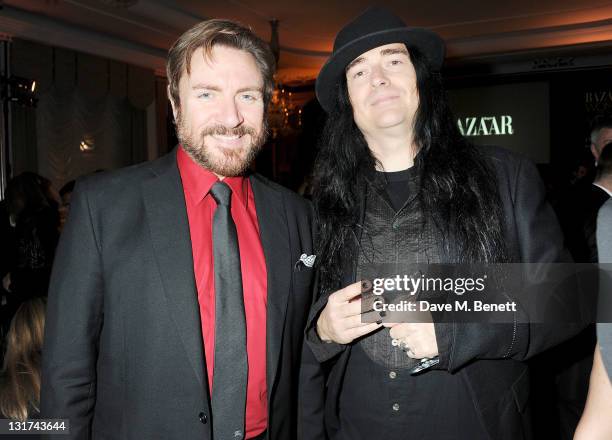 Simon Le Bon and Jonas Ackerlund attend the Harper's Bazaar Women Of The Year Awards in association with Estee Lauder and NET-A-PORTER at Claridges...